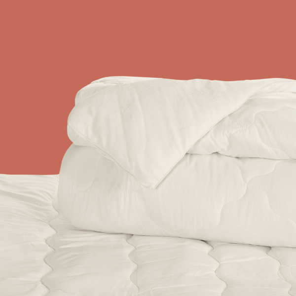 UGG Australia Australian Made wool quilt on bed — 500 GSM all seasons