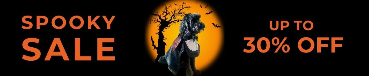 Spooky Sale upto 30% off with a dog dracula sitting in the shadow of a moon